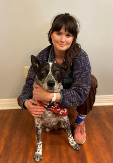 Grace posing with an australian cattle dog. Image from Beechmont Pet Hospital's old website.