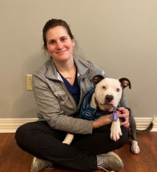 Madison holding a pitbull. Image from Beechmont Pet Hospital's old website.