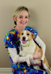 Susan holding a dog. Image from Beechmont Pet Hospital's old website.